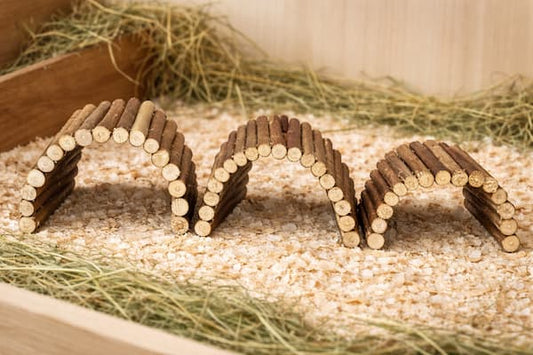 Natural willow chew tunnel toy for rabbits, guinea pigs and hamsters providing a safe hideout and teeth grinding enrichment.