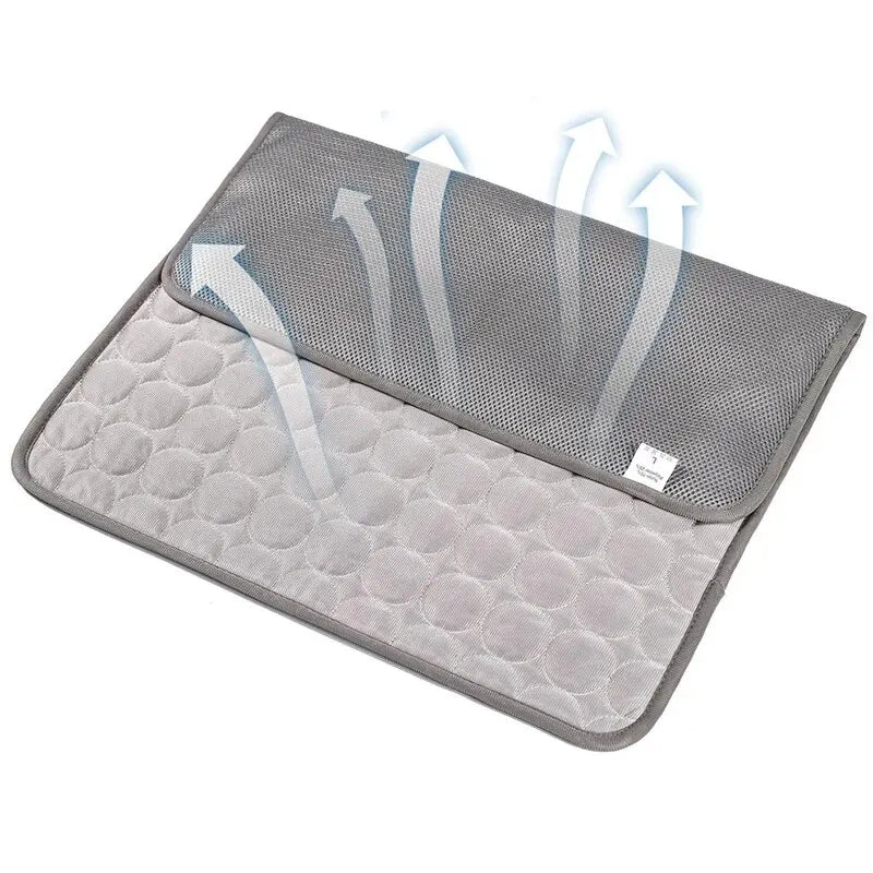 Cooling Pet Ice Mat – Lightweight summer bed for cats and small dogs in blue and grey. Soft, breathable material. Available in two sizes.