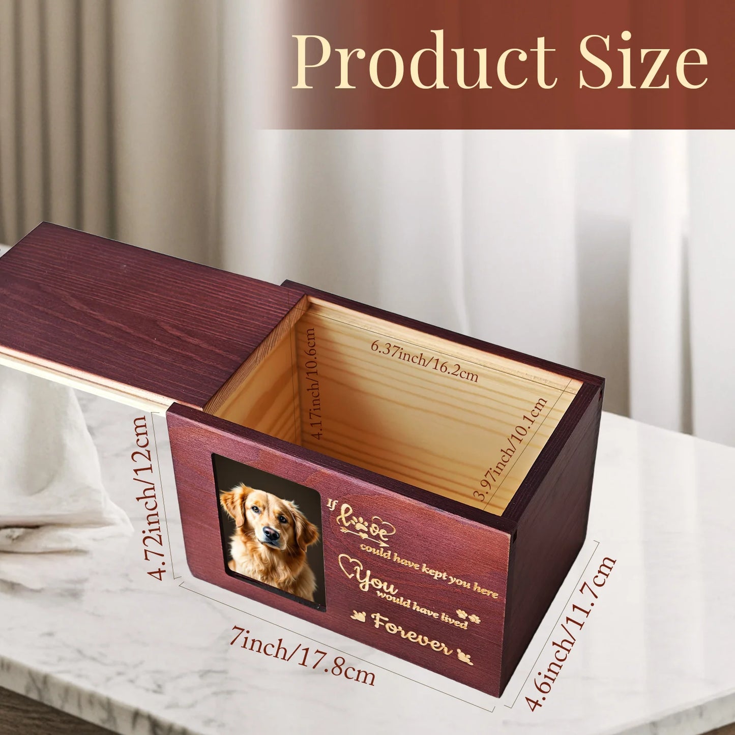 Wooden pet urn with a photo of a dog and engraved text, shown open on a marble surface.