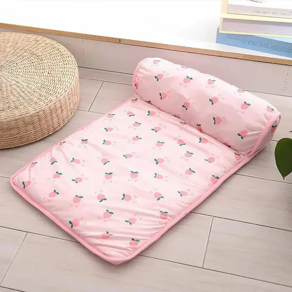 Breathable Summer Cooling Dog & Cat Mat shown on sofa. Lightweight, washable pet blanket designed to keep dogs and cats cool during hot weather.
