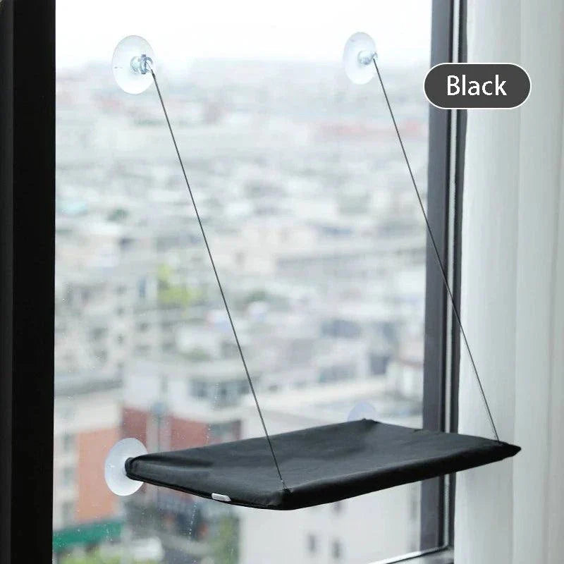 Durable black cat hammock with suction cups installed on a window, supports up to 20KG.