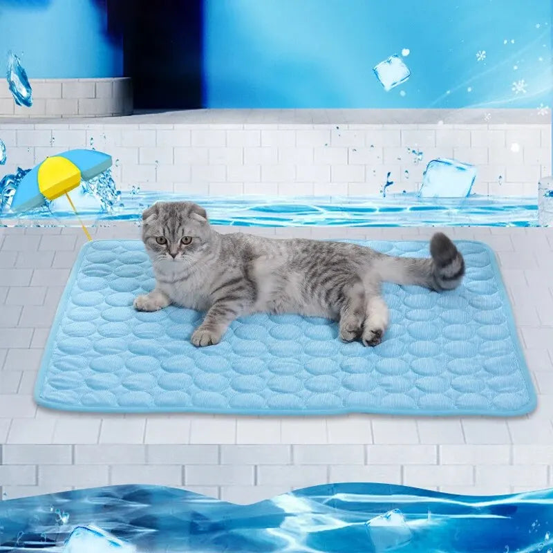 Cooling Pet Ice Mat – Lightweight summer bed for cats and small dogs in blue and grey. Soft, breathable material. Available in two sizes.
