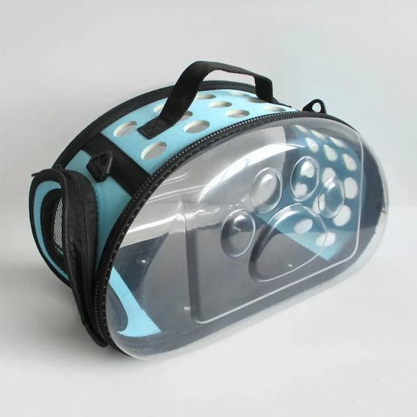 Clear pouch with black zipper and handle on a light gray background