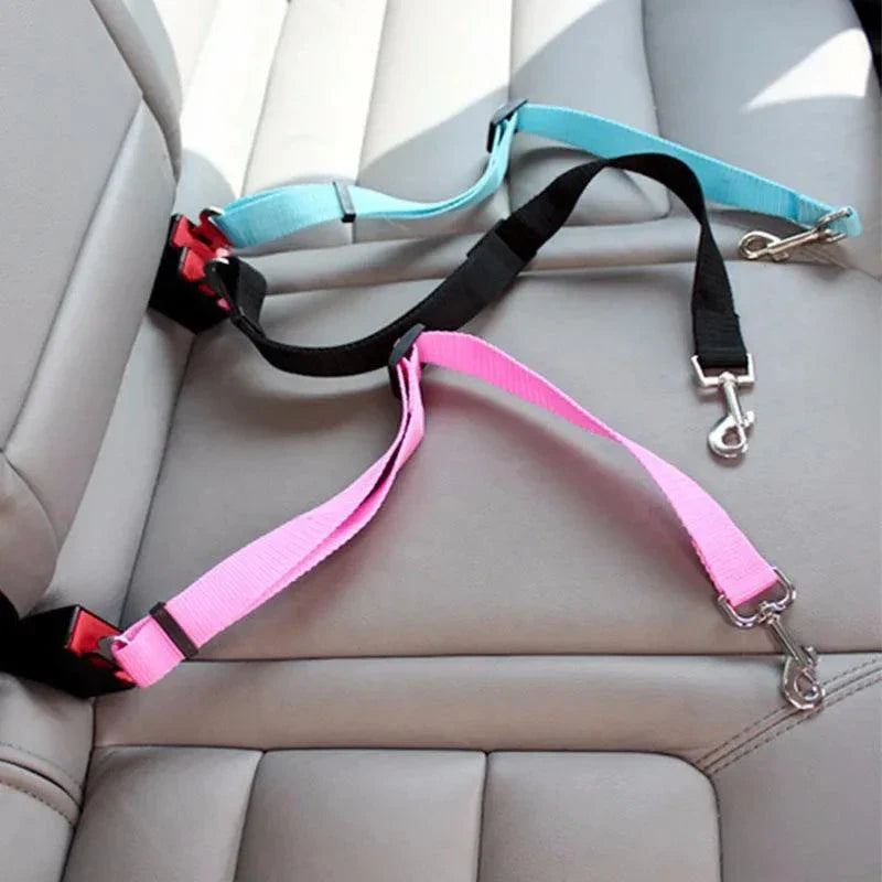 Adjustable Pet Car Seat Belt in use – dog sitting safely in a car with the seat belt attached to its harness."