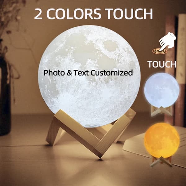 Moon-shaped lamp with customizable text and color options on a wooden stand.