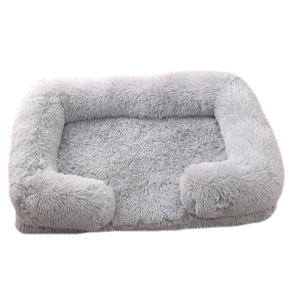 Cozy plush rectangle pet bed, perfect for winter warmth, designed for dogs of all sizes with a non-slip base and stylish look