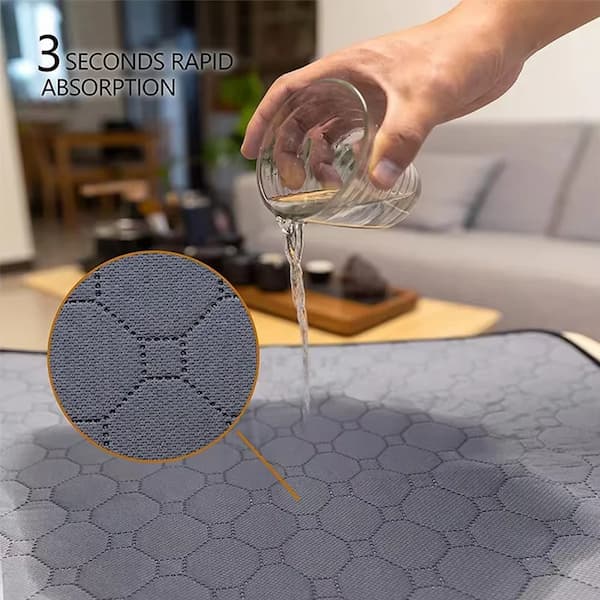 Person pouring water onto a textured surface with a close-up of water absorption, set in a home interior.