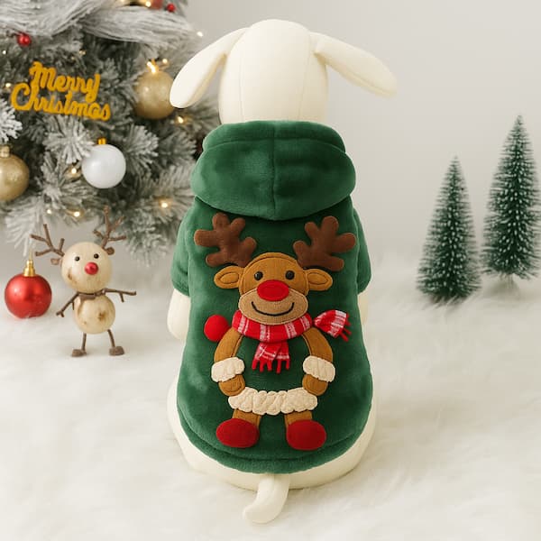 Dog mannequin wearing green Christmas hoodie with plush reindeer design