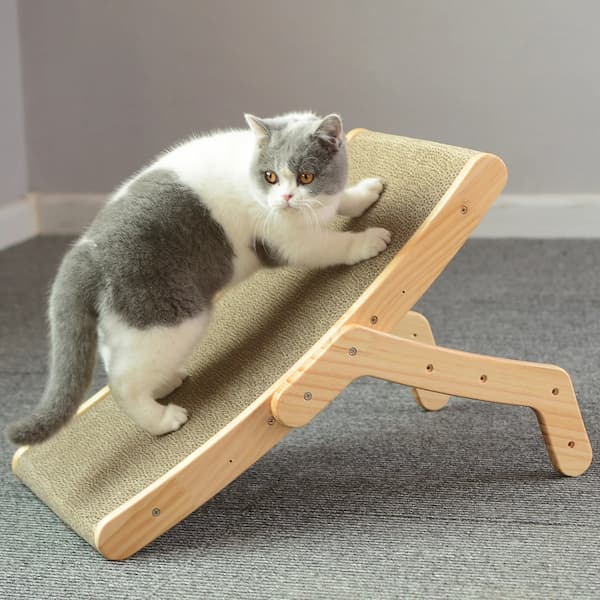 Cat lounging on a wooden ramp with grasscloth surface against a neutral background