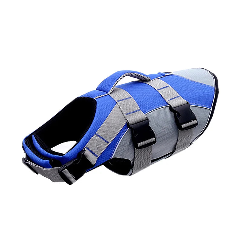 Blue and gray dog life jacket on a white background