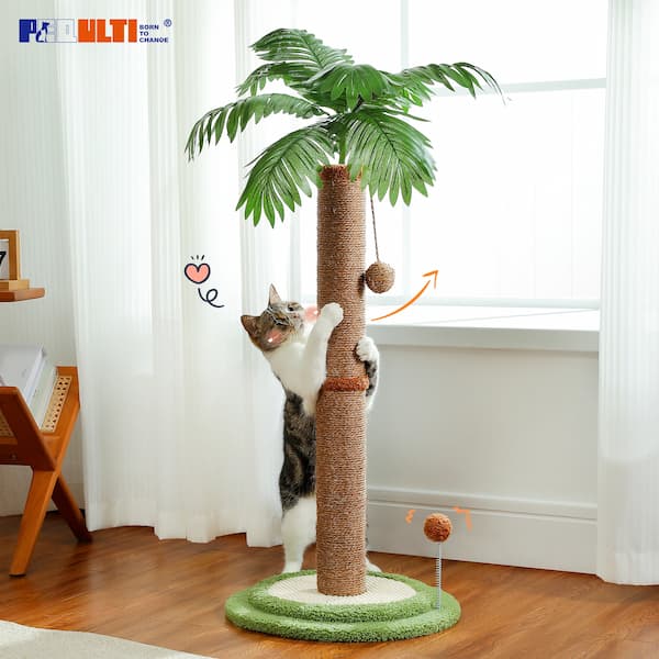 Cat playing with a cat tree with a palm tree design in a room.