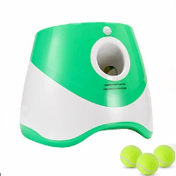 Green and white ball launcher with tennis balls on a white background