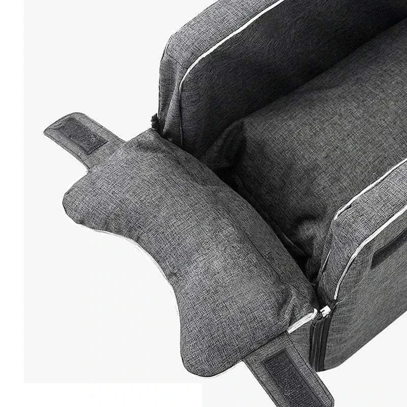 Portable dog car seat bed with adjustable straps and cushioned interior for small pets, ideal for safe and comfortable travel.