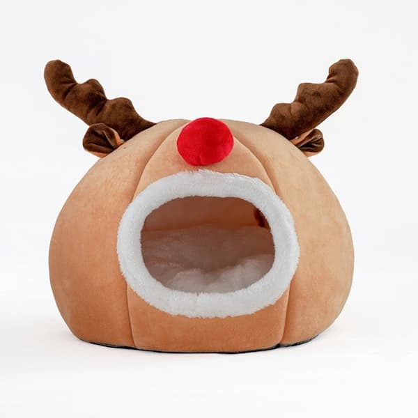 Pet bed designed like a reindeer with brown antlers and red nose on a white background
