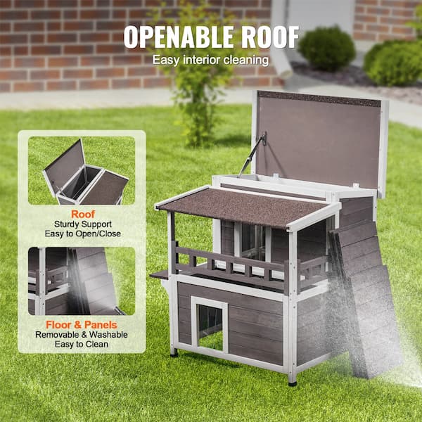 Double-storey cedar outdoor pet house with waterproof asphalt roof.