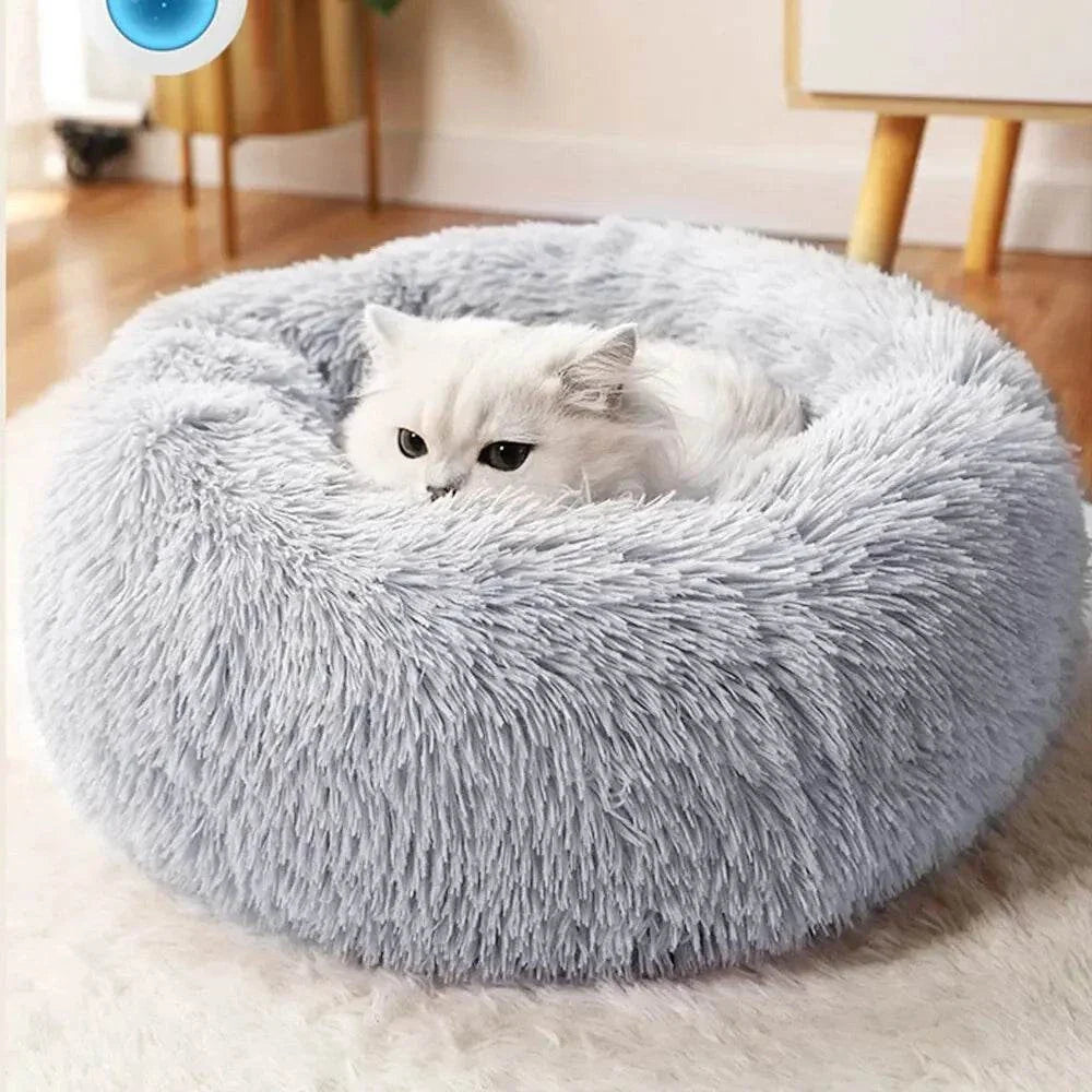 Luxurious plush pet nest for cats and small dogs in various sizes.