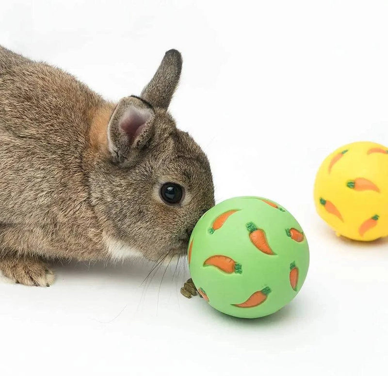 Interactive vinyl treat ball for chickens, rabbits, and small pets – 7.5cm diameter with food dispensing holes.