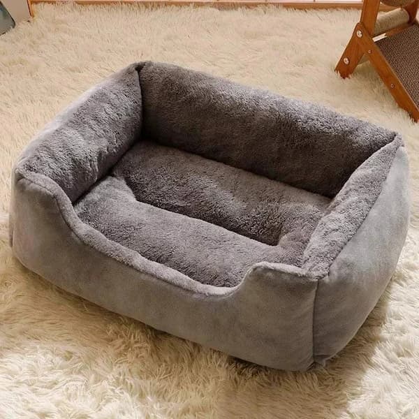 Plush orthopedic cat and dog sofa bed with raised sides and soft calming interior