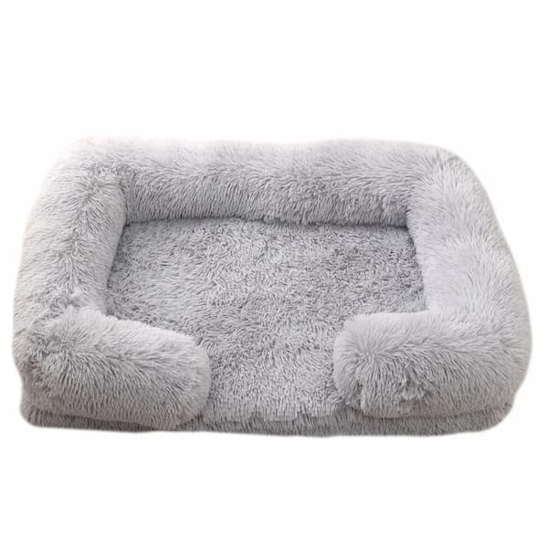 Fluffy gray pet bed on a white background
