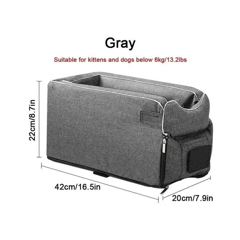 Gray portable dog carrier car seat bed for small pets, featuring cushioned comfort and safety straps for secure car travel.