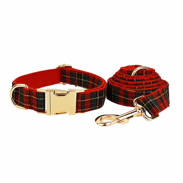 Red plaid dog collar and leash set on a white background