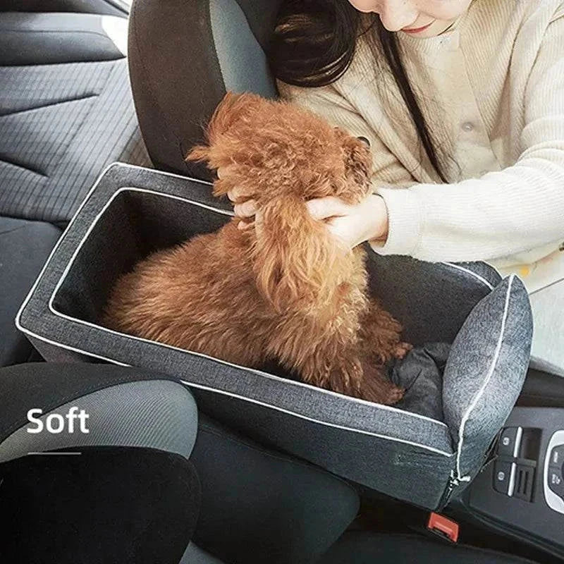 Portable car seat bed for small dogs in vehicle, ensuring pet comfort and safety during travel.