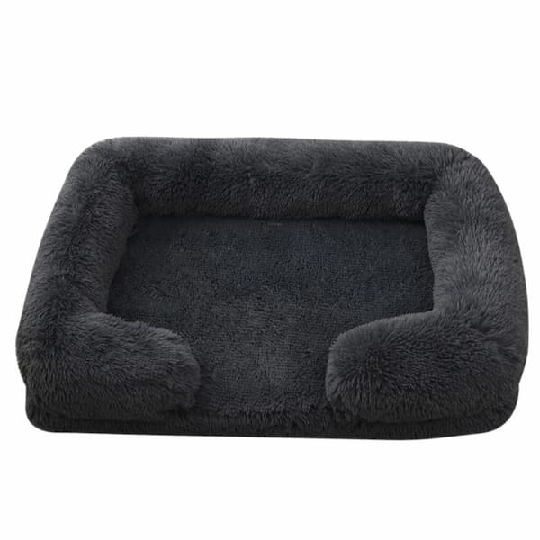 Dark gray pet bed with soft texture on a white background