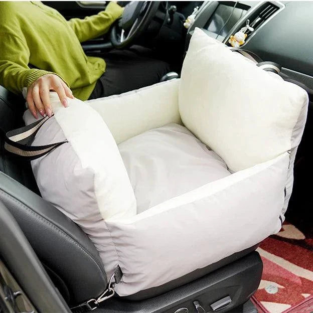 Pet car safety seat bed for dogs, washable and comfortable travel accessory.