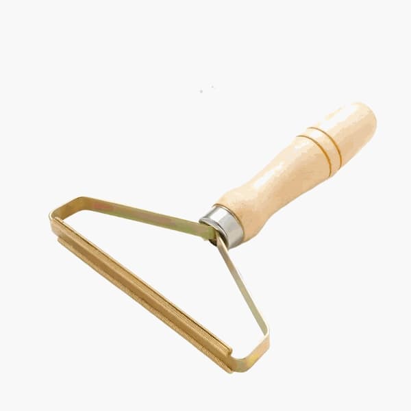 pet hair lint remover on sofa fabric