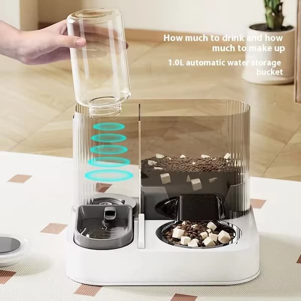 Pet feeding and water station with a transparent water container being filled.