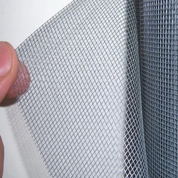 Mosquito protection net covering rabbit hutch to help keep insects away from small pets