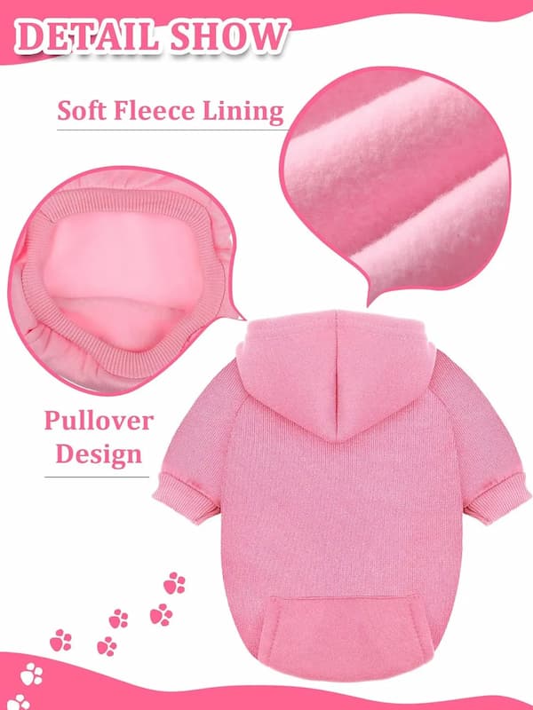 Pink fleece-lined dog pullover with detailed views of soft lining and design on a white background.