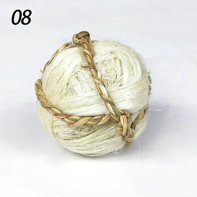 Braided natural grass chew ball for small pets, 7cm toy for guinea pigs, rabbits, and hamsters.