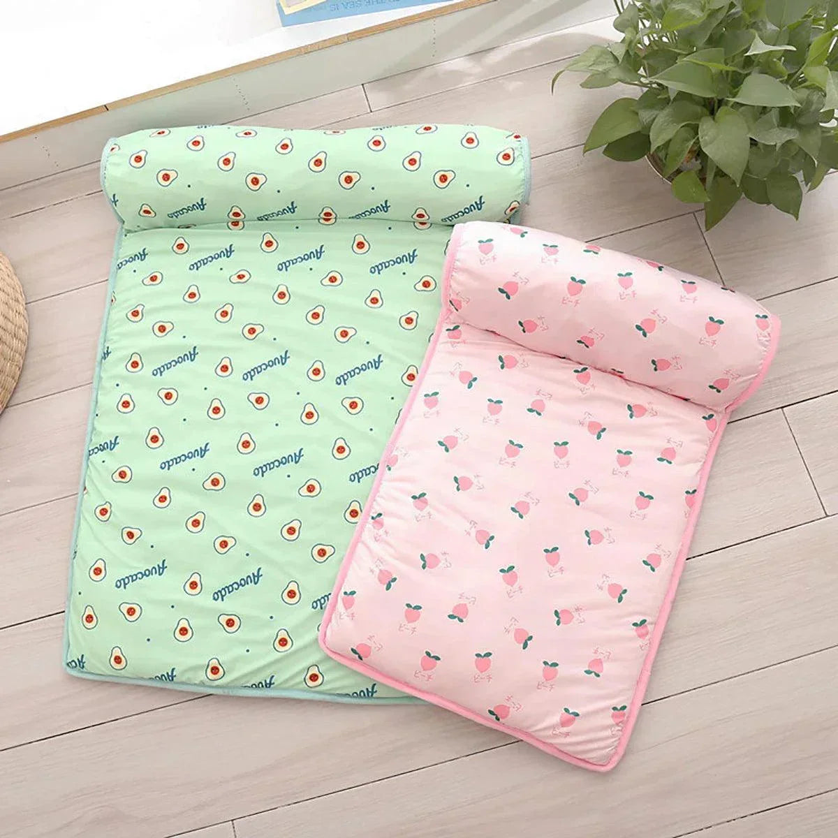 Dog cooling summer pad bed in avocado and pink patterns, washable and comfortable for pets.