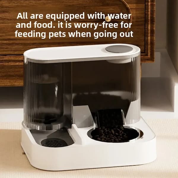 Pet feeder with water and food compartments on a wooden surface.