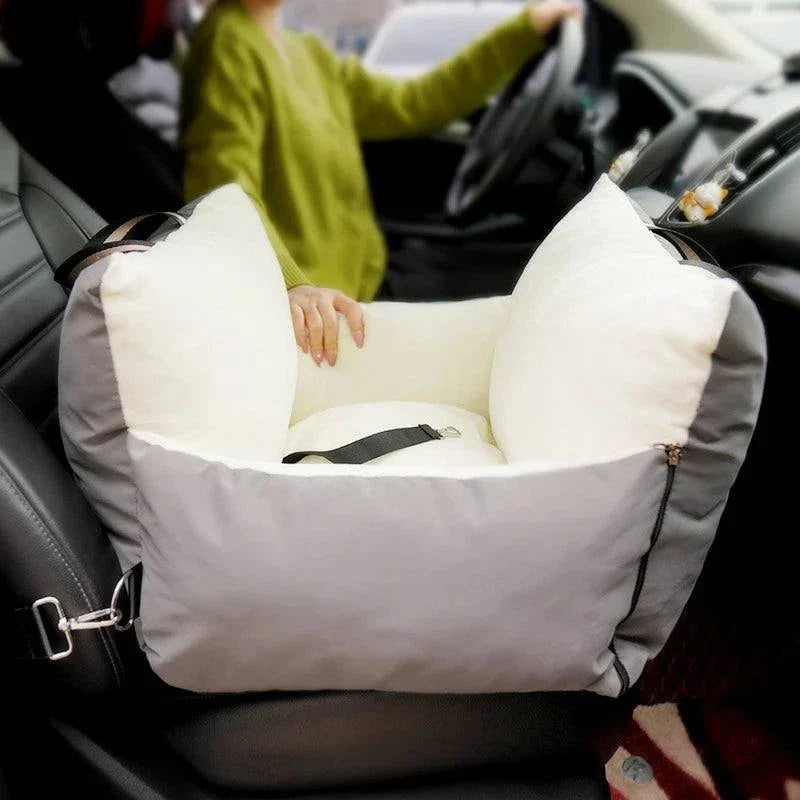 Pet car safety seat bed for dogs, offering comfortable and stylish travel with a washable design.