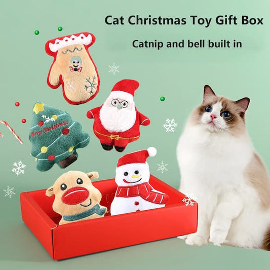 Cat Christmas toy gift set with catnip and bell built-in, featuring a cat sitting next to the toys.