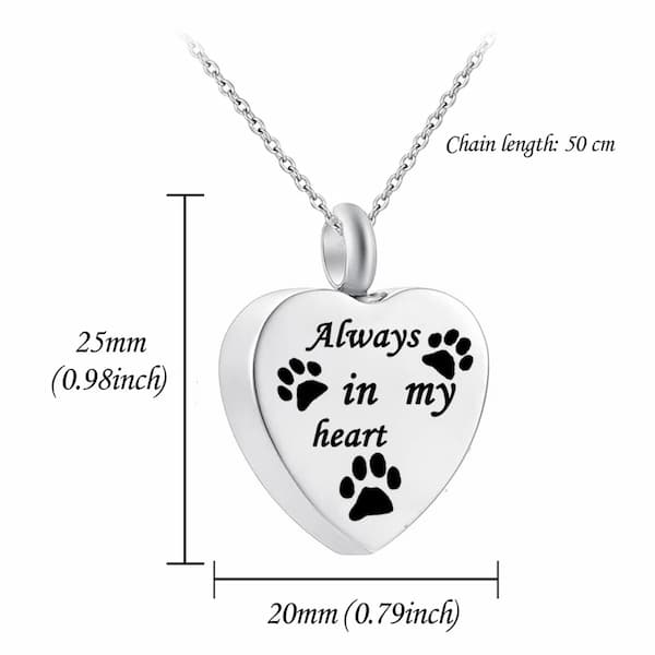 Heart-shaped pendant with 'Always in my heart' and paw prints on a white background