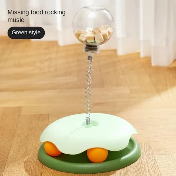 Green interactive treat dispensing toy for cats and dogs puzzle feeder slow pet enrichment toy