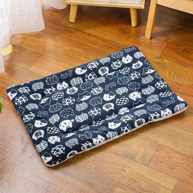 Soft flannel pet sleeping mat for dogs and cats, usable as a bed, couch cover, or blanket for small and large pets