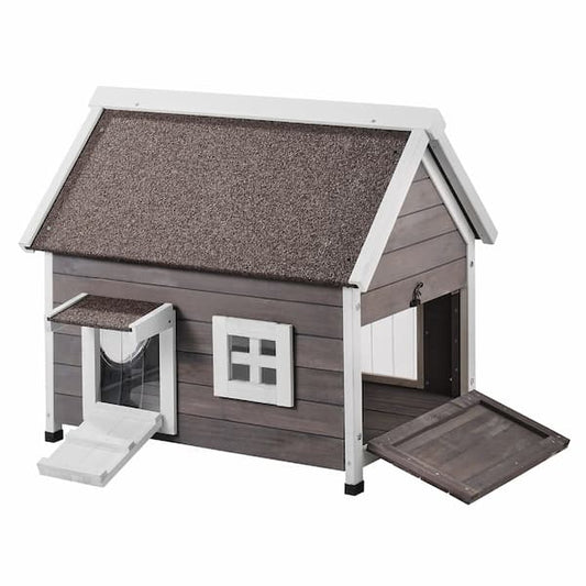 Premium cedar outdoor cat house with asphalt roof and escape door placed on grass – weatherproof wooden shelter for feral and outdoor cats.