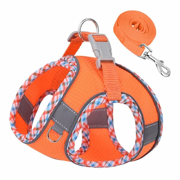 Orange dog harness and leash set with plaid pattern on a white background
