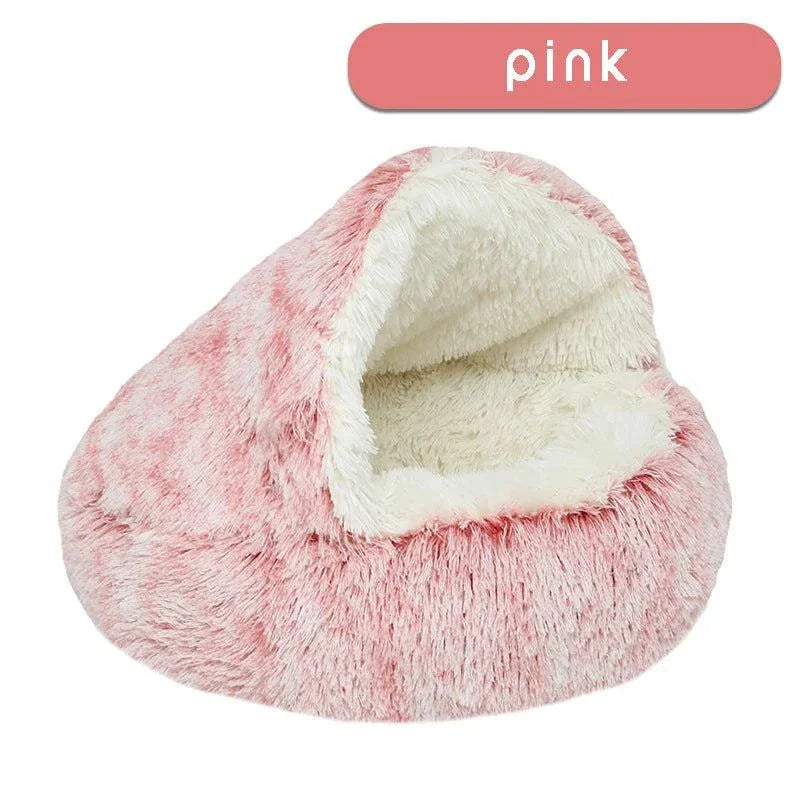 Cozy plush pet bed with a cat nestled inside, designed for small dogs and cats, featuring a soft, round sleeping nest with a cave-style opening.