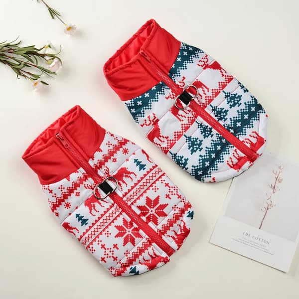 Two dog coats with festive patterns on a light background