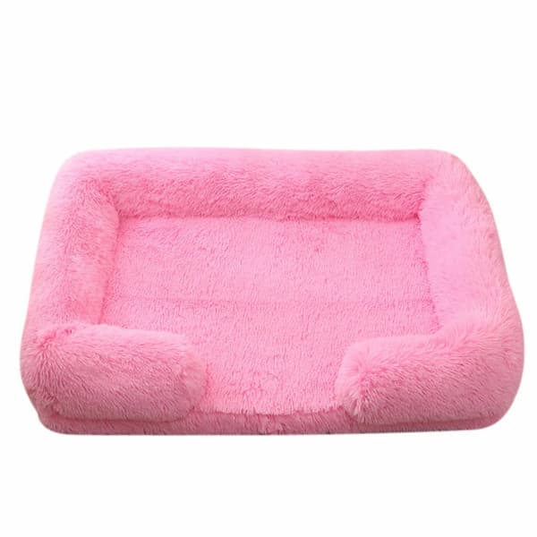 Pink pet bed on a white background