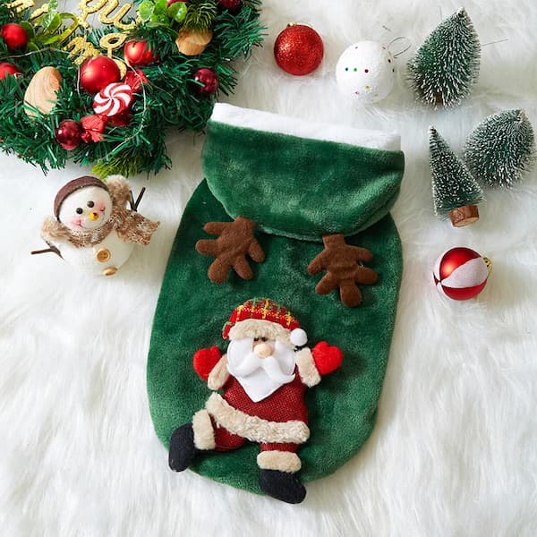 Green Christmas pet hoodie with Santa Claus figure surrounded by festive decorations on a white background