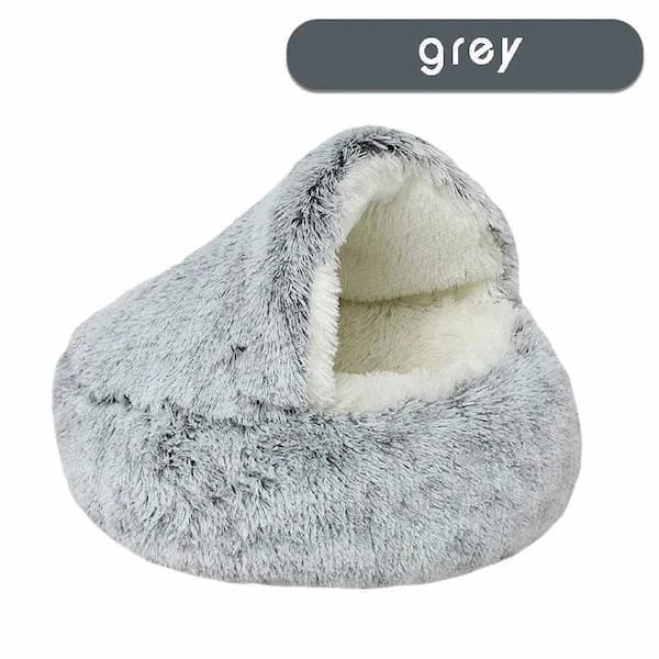 Fluffy gray pet bed with white interior on a white background