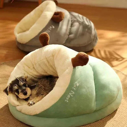 Warm slipper-shaped pet bed with cozy material for small dogs and cats.