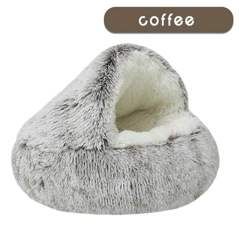 Cozy plush pet bed with a cat nestled inside, designed for small dogs and cats, featuring a soft, round sleeping nest with a cave-style opening.