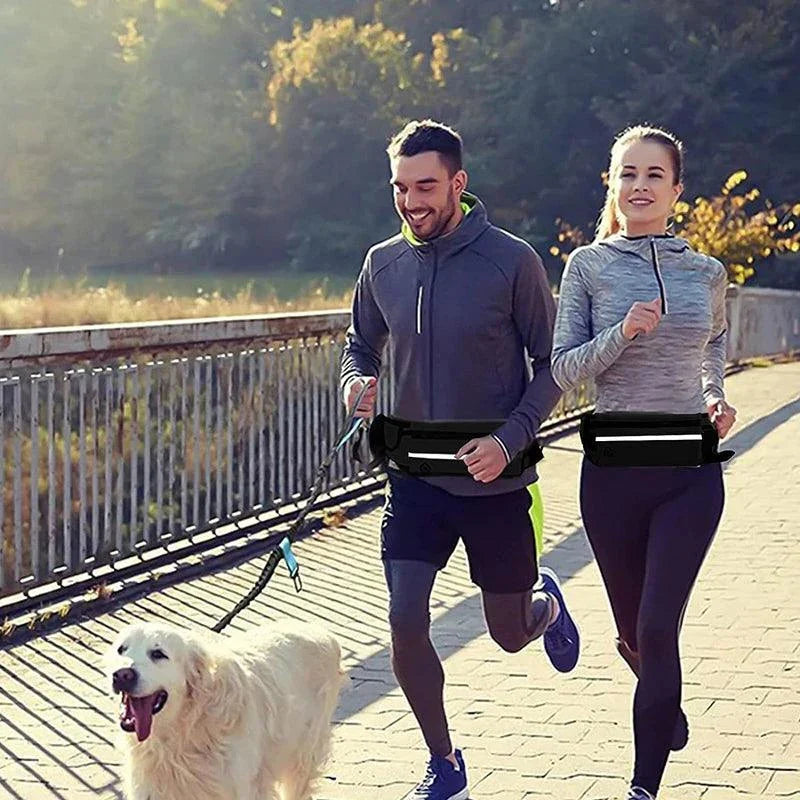 Hands-Free Reflective Dog Leash – pet owner jogging with a dog, featuring an adjustable waist bag and elastic leash